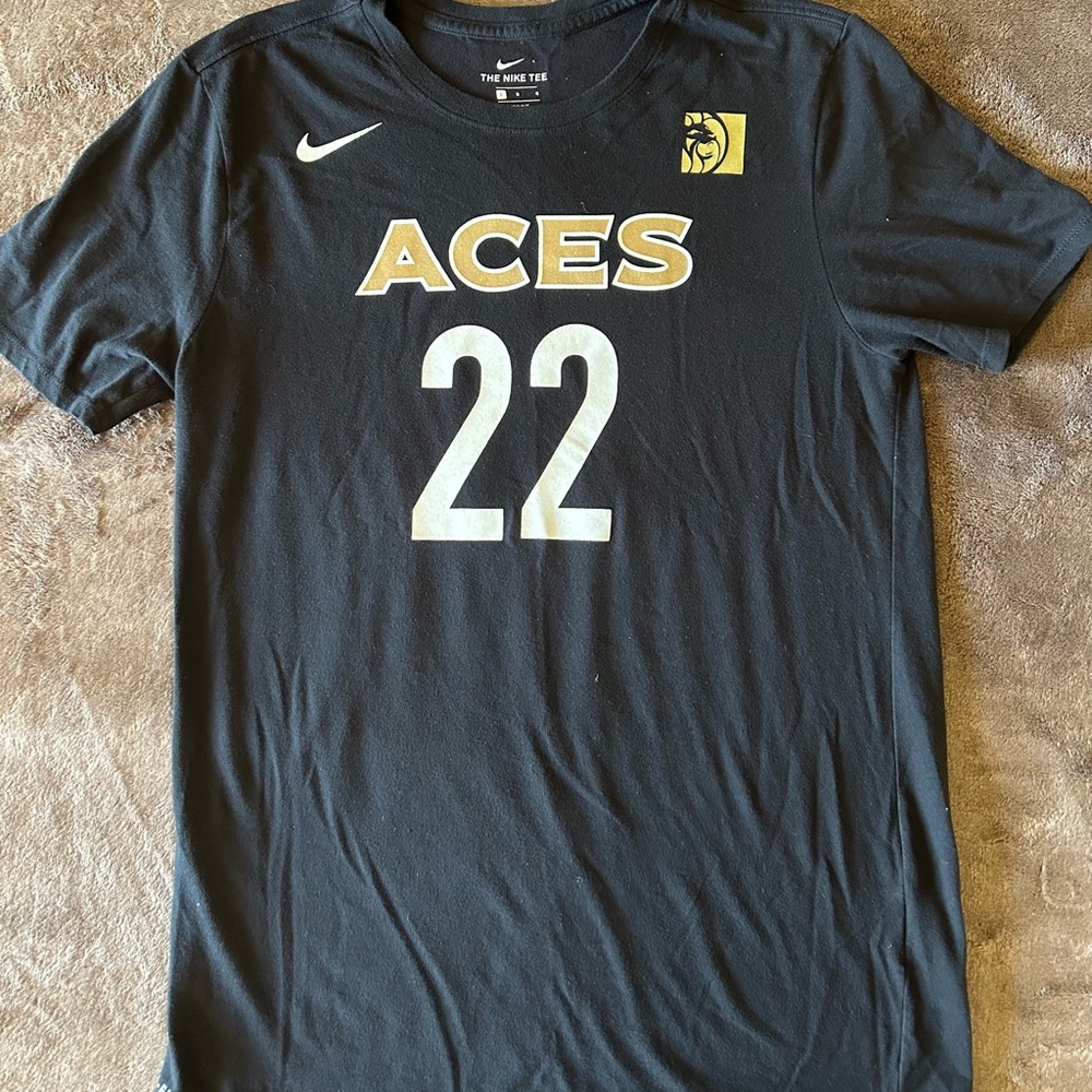 Nike Black and Gold Graphic Tee